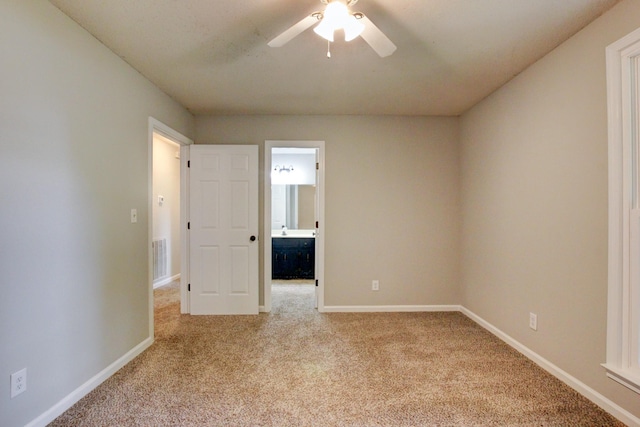 1420 E Rhett Butler Rd, Clarksville, TN 37042 - empty room featuring carpet, a ceiling fan, and baseboards