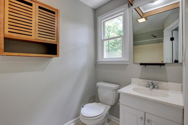 1420 E Rhett Butler Rd, Clarksville, TN 37042 - bathroom featuring baseboards, vanity, and toilet