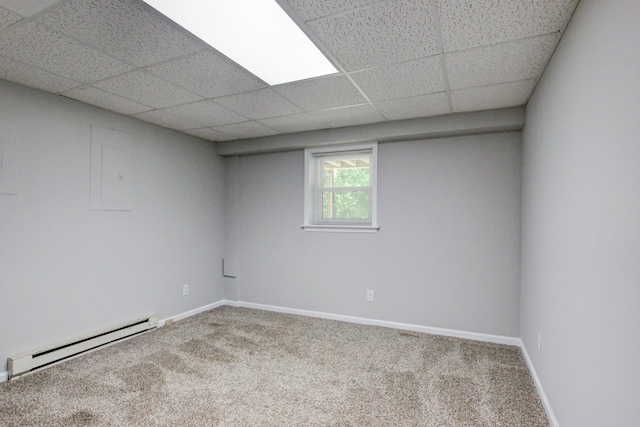 1420 E Rhett Butler Rd, Clarksville, TN 37042 - carpeted empty room with a baseboard radiator, a drop ceiling, and baseboards