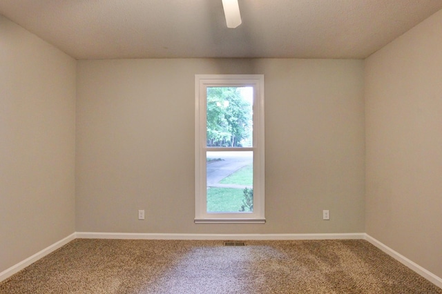1420 E Rhett Butler Rd, Clarksville, TN 37042 - carpeted spare room featuring baseboards and a ceiling fan