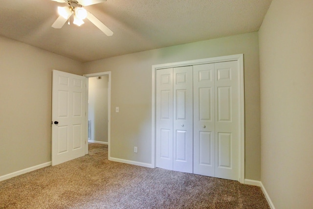 1420 E Rhett Butler Rd, Clarksville, TN 37042 - unfurnished bedroom featuring carpet, baseboards, a closet, and a ceiling fan