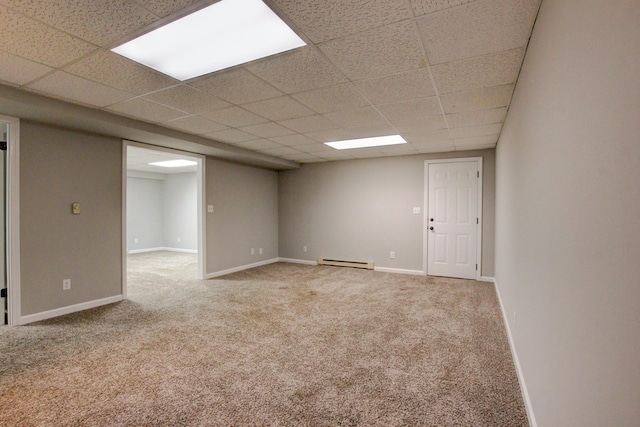 1420 E Rhett Butler Rd, Clarksville, TN 37042 - carpeted spare room featuring baseboard heating, a drop ceiling, and baseboards