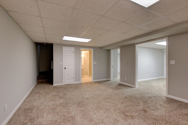 1420 E Rhett Butler Rd, Clarksville, TN 37042 - finished below grade area with a drop ceiling, carpet floors, and baseboards