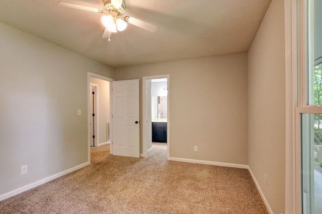 1420 E Rhett Butler Rd, Clarksville, TN 37042 - unfurnished room featuring light colored carpet, ceiling fan, and baseboards
