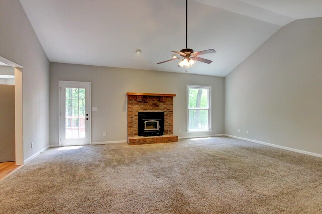 1420 E Rhett Butler Rd, Clarksville, TN 37042 - unfurnished living room featuring a ceiling fan, lofted ceiling, carpet floors, and baseboards