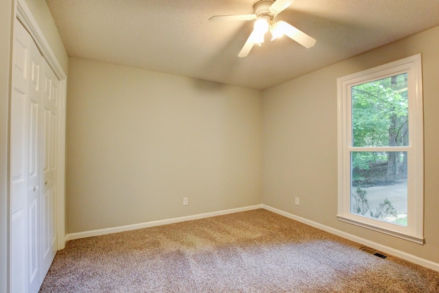 1420 E Rhett Butler Rd, Clarksville, TN 37042 - unfurnished bedroom featuring carpet flooring, a closet, baseboards, and ceiling fan