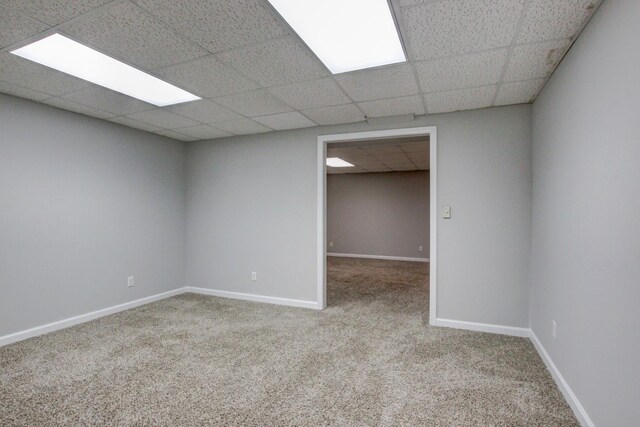 1420 E Rhett Butler Rd, Clarksville, TN 37042 - carpeted empty room featuring a paneled ceiling and baseboards