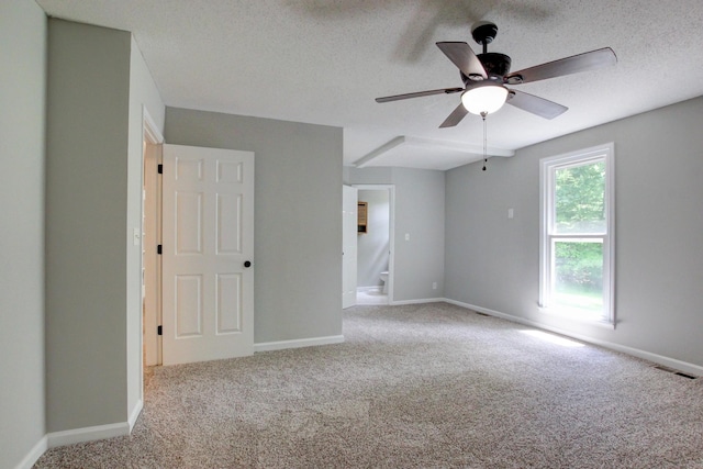 1420 E Rhett Butler Rd, Clarksville, TN 37042 - empty room featuring carpet, a ceiling fan, baseboards, and a textured ceiling