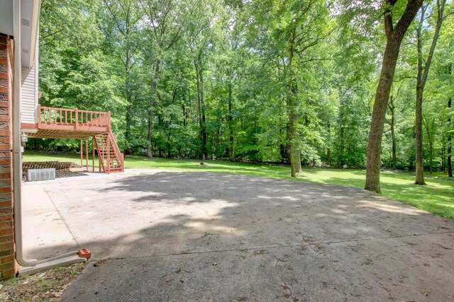 1420 E Rhett Butler Rd, Clarksville, TN 37042 - view of patio / terrace featuring stairs, a deck, and a view of trees