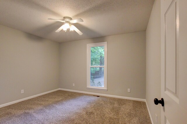 1420 E Rhett Butler Rd, Clarksville, TN 37042 - carpeted spare room with ceiling fan, a textured ceiling, and baseboards