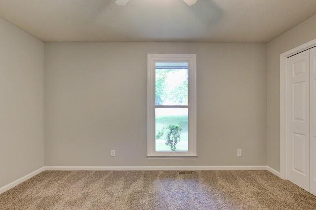 1420 E Rhett Butler Rd, Clarksville, TN 37042 - carpeted empty room with plenty of natural light, baseboards, and a ceiling fan