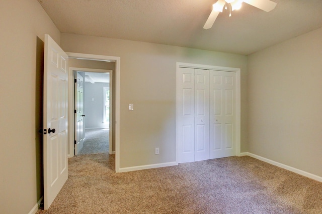 1420 E Rhett Butler Rd, Clarksville, TN 37042 - unfurnished bedroom with light carpet, a closet, baseboards, and ceiling fan