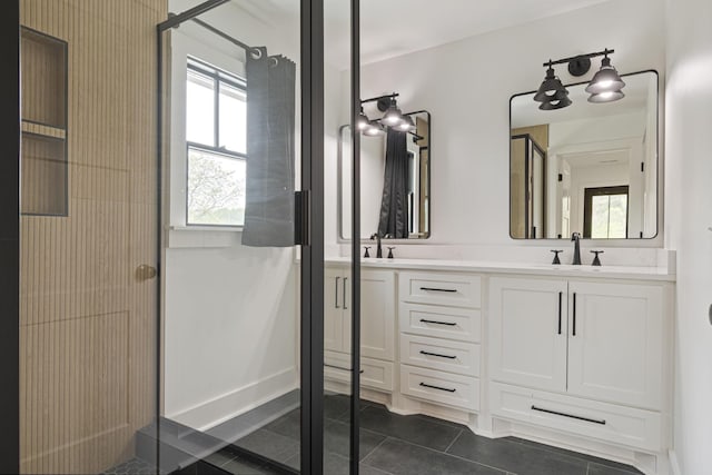 4824 Leipers Creek Rd, Williamsport, TN 38487 - bathroom featuring tile patterned floors, a walk in shower, and double vanity