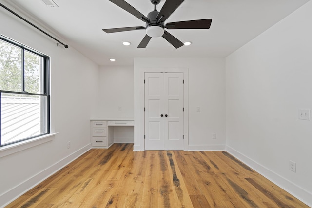 4824 Leipers Creek Rd, Williamsport, TN 38487 - unfurnished bedroom featuring baseboards, recessed lighting, light wood finished floors, an office area, and ceiling fan