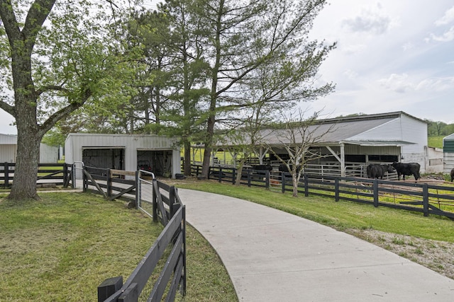 4824 Leipers Creek Rd, Williamsport, TN 38487 - view of property's community featuring an exterior structure, an outdoor structure, and a garage