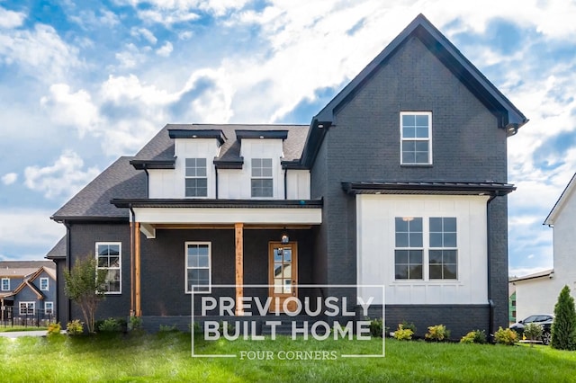 5517 Sinclair St, Murfreesboro, TN 37127 - view of front of home with a front yard, brick siding, and covered porch