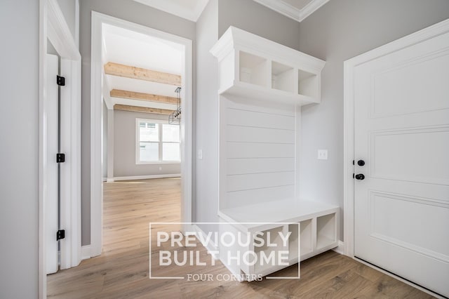 5517 Sinclair St, Murfreesboro, TN 37127 - mudroom with wood finished floors, beamed ceiling, and ornamental molding