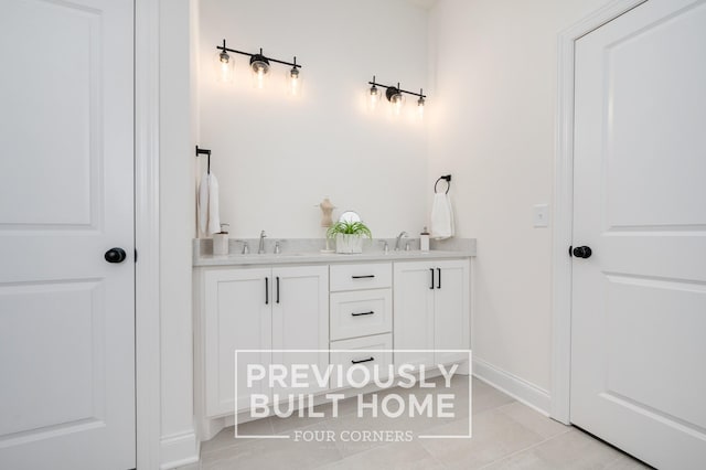 5520 Sinclair St, Murfreesboro, TN 37127 - bathroom with tile patterned floors, baseboards, and double vanity