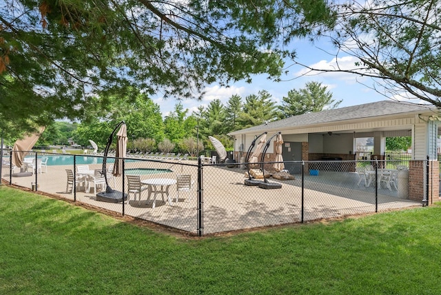 community pool featuring a patio area and a ceiling fan