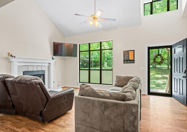 1015 Cross Country Dr, Kingston Springs, TN 37082 - living area with high vaulted ceiling, healthy amount of natural light, ceiling fan, and light wood finished floors