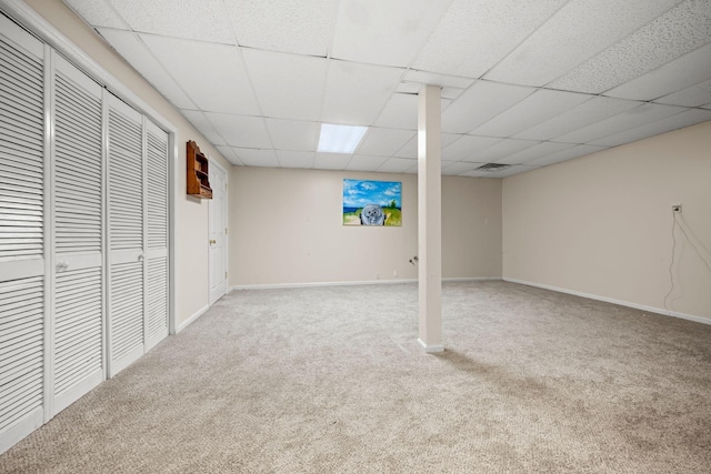 1015 Cross Country Dr, Kingston Springs, TN 37082 - finished basement featuring carpet floors, a drop ceiling, and baseboards