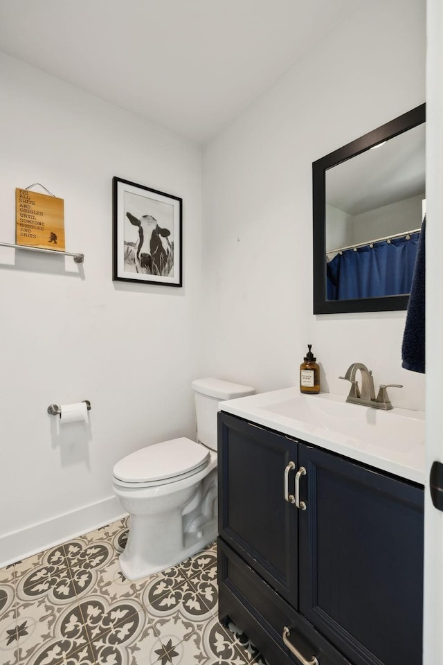 273 Halltown Rd, Cottontown, TN 37048 - full bath featuring toilet, tile patterned flooring, vanity, and baseboards