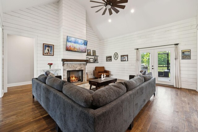 273 Halltown Rd, Cottontown, TN 37048 - living area featuring high vaulted ceiling, a ceiling fan, french doors, wood walls, and dark wood-style flooring