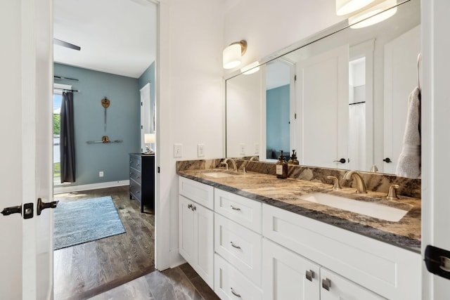 273 Halltown Rd, Cottontown, TN 37048 - bathroom featuring double vanity and baseboards