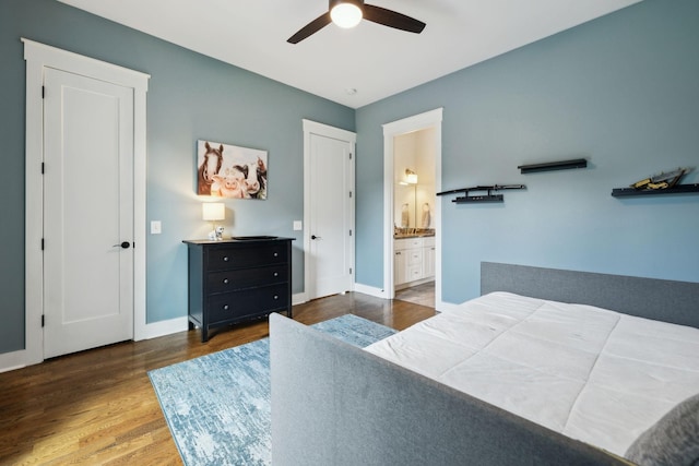 273 Halltown Rd, Cottontown, TN 37048 - bedroom with wood finished floors, ensuite bath, baseboards, and a ceiling fan