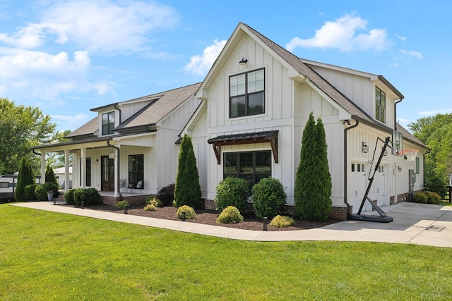 273 Halltown Rd, Cottontown, TN 37048 - modern inspired farmhouse with board and batten siding, a porch, a front yard, roof with shingles, and driveway