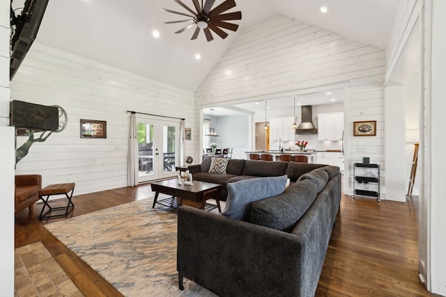 273 Halltown Rd, Cottontown, TN 37048 - living area with high vaulted ceiling, wooden walls, a ceiling fan, dark wood finished floors, and recessed lighting