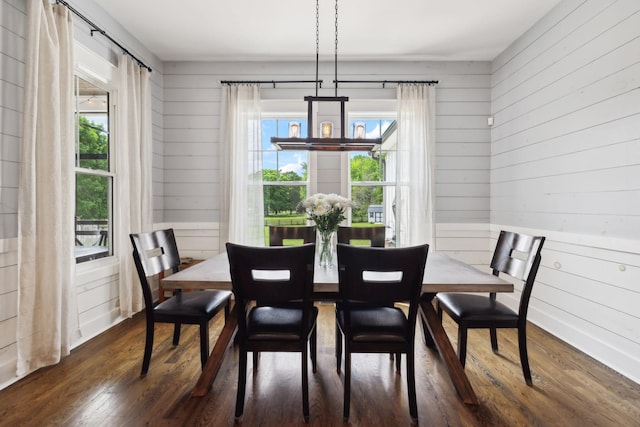 273 Halltown Rd, Cottontown, TN 37048 - dining area with a chandelier, dark wood-type flooring, and wooden walls