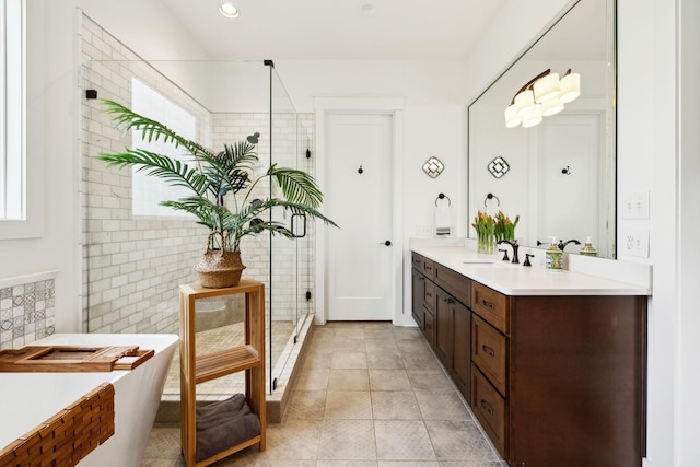 273 Halltown Rd, Cottontown, TN 37048 - bathroom with a stall shower, vanity, tile patterned flooring, a freestanding bath, and recessed lighting