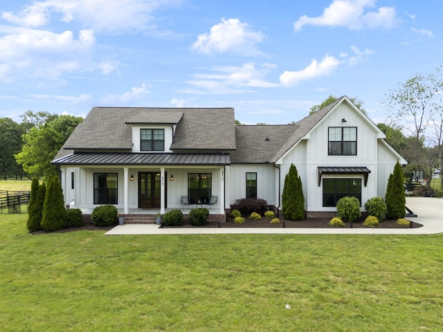 273 Halltown Rd, Cottontown, TN 37048 - modern farmhouse style home featuring board and batten siding, a standing seam roof, a shingled roof, and metal roof
