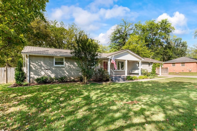 208 Meadowgreen Dr, Franklin, TN 37069 - single story home with covered porch, brick siding, and metal roof