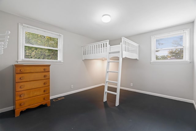 208 Meadowgreen Dr, Franklin, TN 37069 - unfurnished bedroom featuring multiple windows and baseboards
