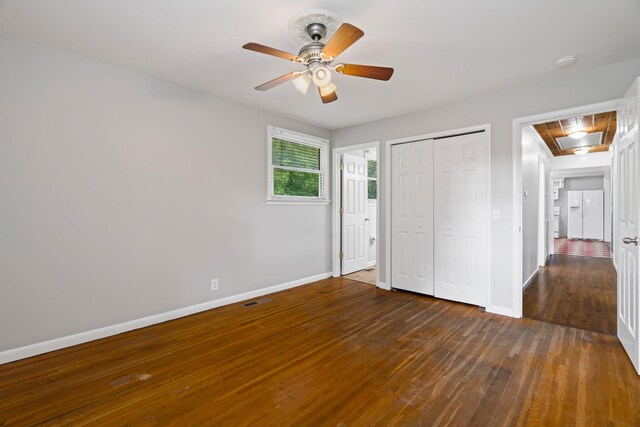208 Meadowgreen Dr, Franklin, TN 37069 - unfurnished bedroom with baseboards, wood-type flooring, a closet, and ceiling fan