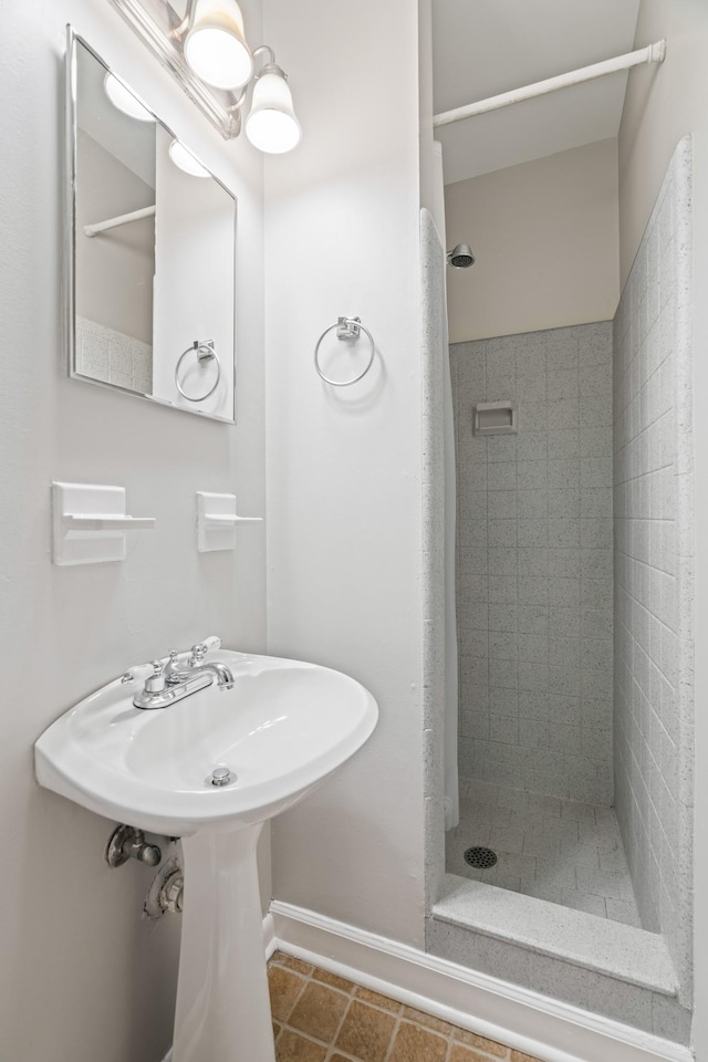 208 Meadowgreen Dr, Franklin, TN 37069 - bathroom with a shower stall, tile patterned floors, and baseboards