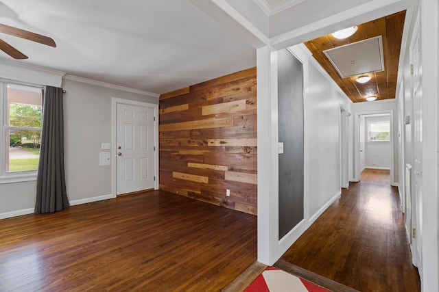 208 Meadowgreen Dr, Franklin, TN 37069 - hall with wood finished floors, wooden walls, attic access, ornamental molding, and baseboards