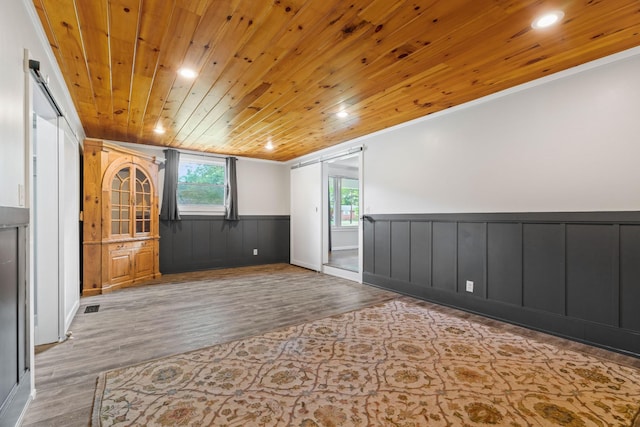 208 Meadowgreen Dr, Franklin, TN 37069 - spare room featuring wood finished floors, a wainscoted wall, wooden ceiling, ornamental molding, and recessed lighting