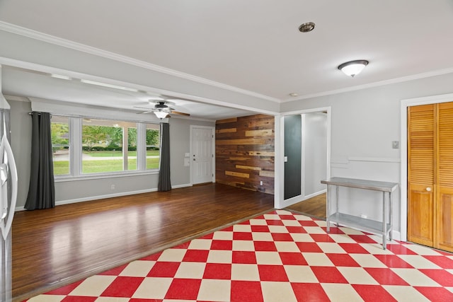 208 Meadowgreen Dr, Franklin, TN 37069 - unfurnished living room featuring wood finished floors, crown molding, baseboards, ceiling fan, and wood walls