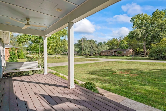 208 Meadowgreen Dr, Franklin, TN 37069 - wooden terrace with a lawn, ceiling fan, a porch, and view of wooded area