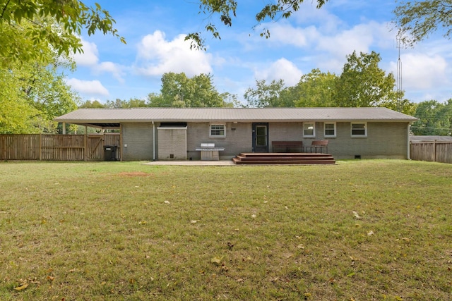 208 Meadowgreen Dr, Franklin, TN 37069 - rear view of property with crawl space, metal roof, a patio, and brick siding