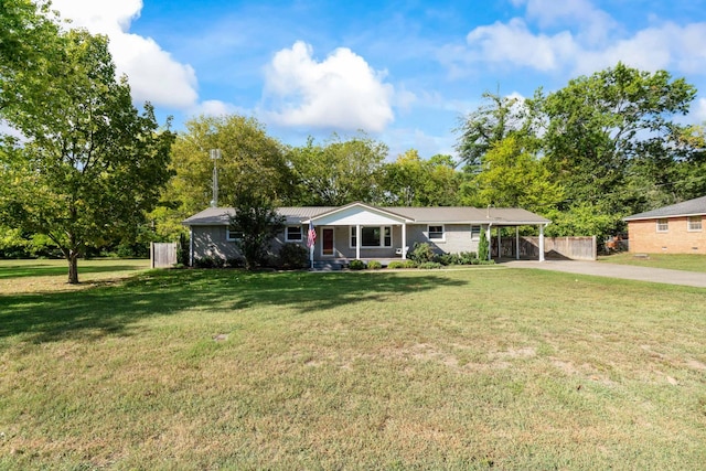 208 Meadowgreen Dr, Franklin, TN 37069 - ranch-style house with driveway, covered porch, a carport, and view of wooded area
