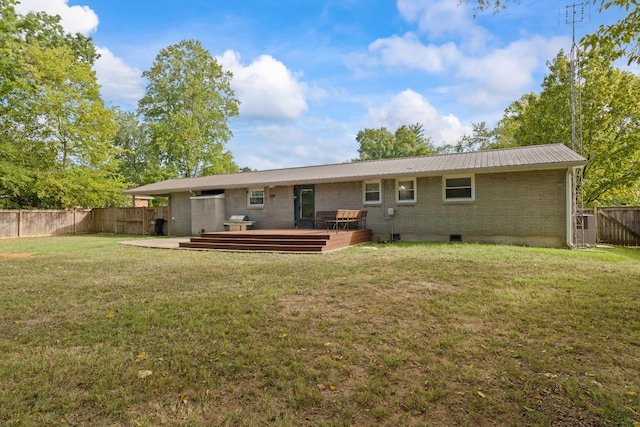 208 Meadowgreen Dr, Franklin, TN 37069 - back of property with a wooden deck, brick siding, metal roof, and crawl space