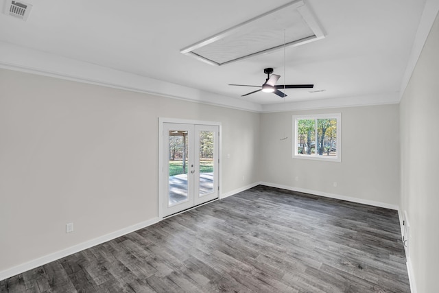 10 Grinnell Dr, Lawrenceburg, TN 38464 - unfurnished room featuring attic access, french doors, wood finished floors, baseboards, and ornamental molding