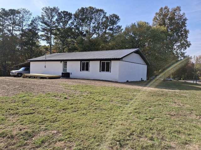 10 Grinnell Dr, Lawrenceburg, TN 38464 - ranch-style home featuring a front yard, metal roof, and cooling unit