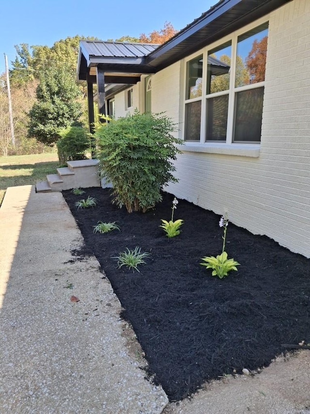 10 Grinnell Dr, Lawrenceburg, TN 38464 - view of side of property with brick siding and metal roof