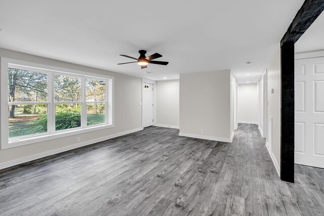 10 Grinnell Dr, Lawrenceburg, TN 38464 - unfurnished living room featuring wood finished floors, ceiling fan, baseboards, and recessed lighting