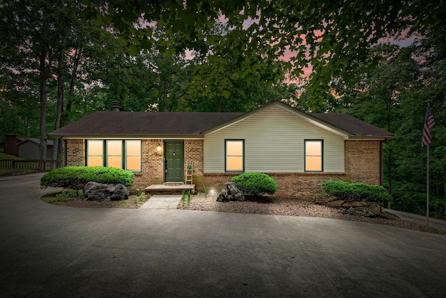 ranch-style house with brick siding